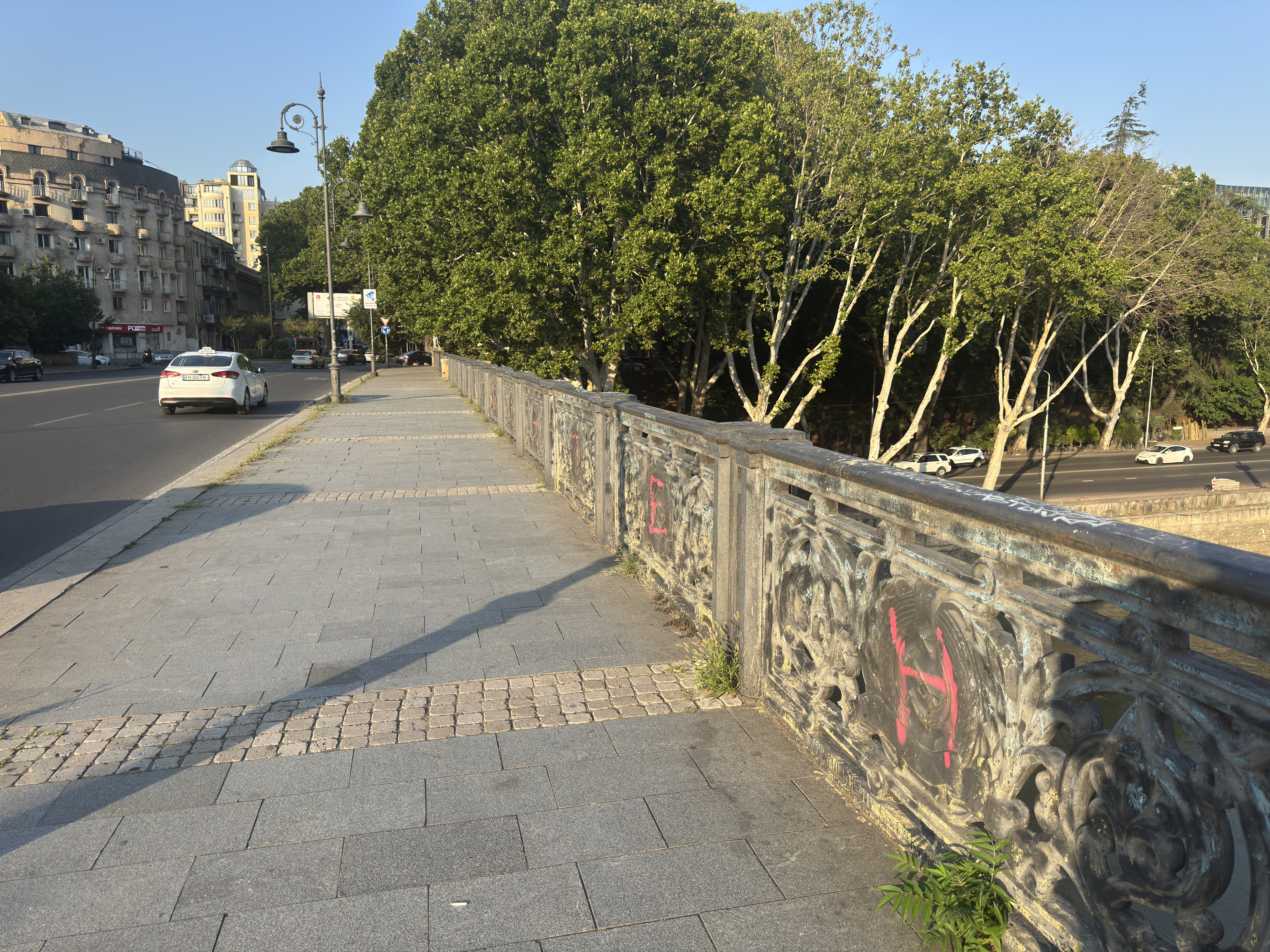 Intact hammer and sickle relief panel on the Galaktion Tabidze bridge.